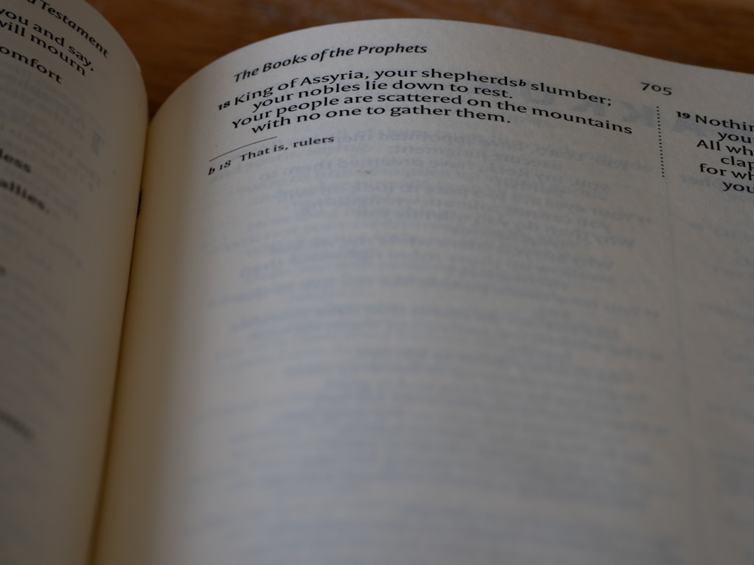 a close up of an open book on a table